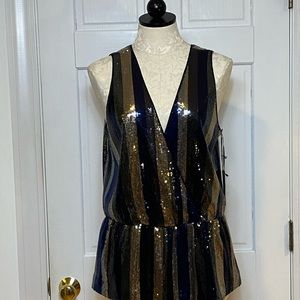Sequin sleeveless top: reversible, peplum, throwback cool.